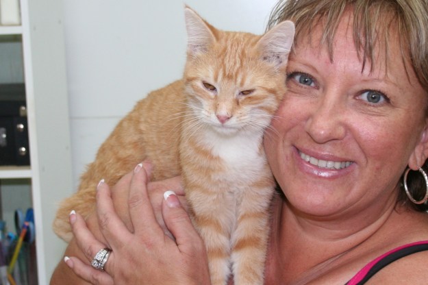 Bad Cat Chris at adoption center with Rose.